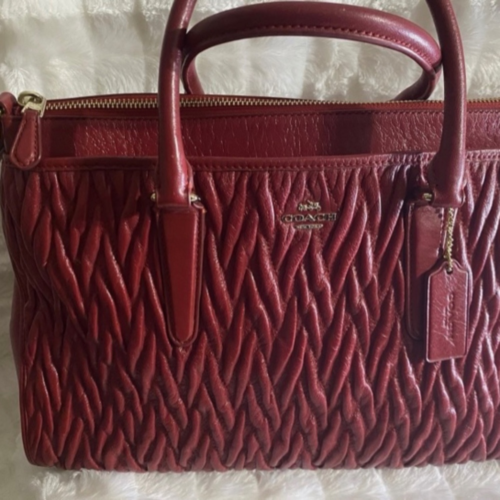 Gently used Beautiful Coach Handbag, Plum Wine